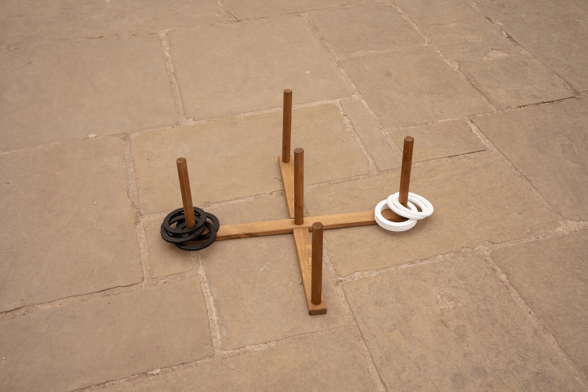 Premium outdoor games collection by Social Set, including Giant Jenga, Giant Connect Four, Cornhole, Ring Toss, Dominoes and Noughts & Crosses for event hire.