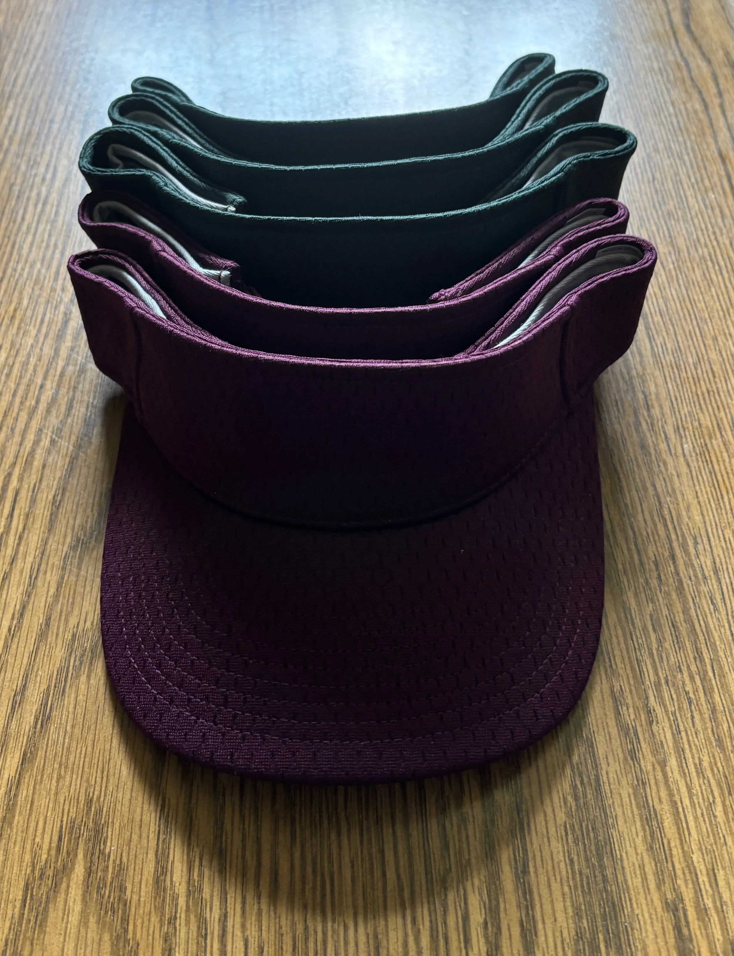 A few of the visors donated by Small Town Miles