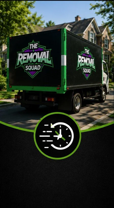 A moving truck with 'The Removal Squad' logo parked on a residential street with trees and houses.