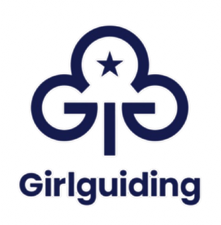 Logo featuring a stylized key with a star at the top and the word 'Girlguiding' below it.