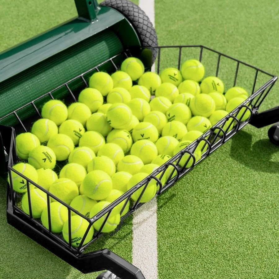 tennis-ball-collector-mower-basket-on-bottom-with-tennis-balls.jpg
