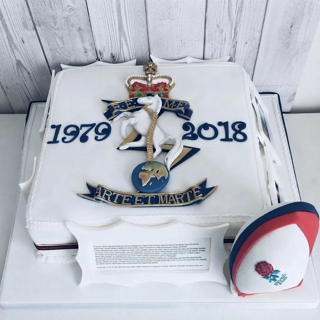 A commemorative Army cake celebrating REME, featuring a knight on a white horse, military emblem, and the dates 1979 and 2018, marking 39 years of service.