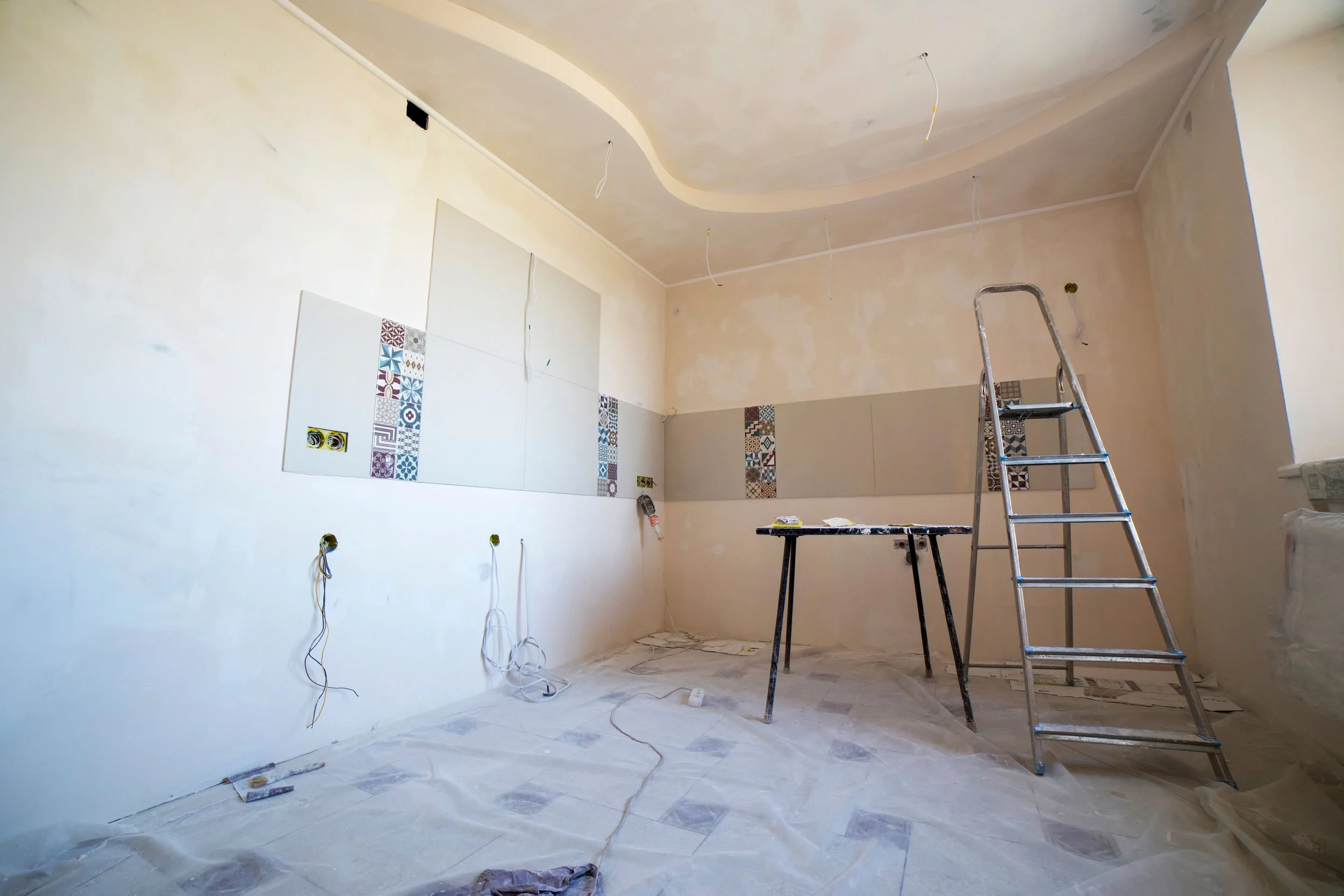 Interior home remodeling project featuring custom ceiling details and wall preparation by Modern Edge Builders in Western North Carolina.