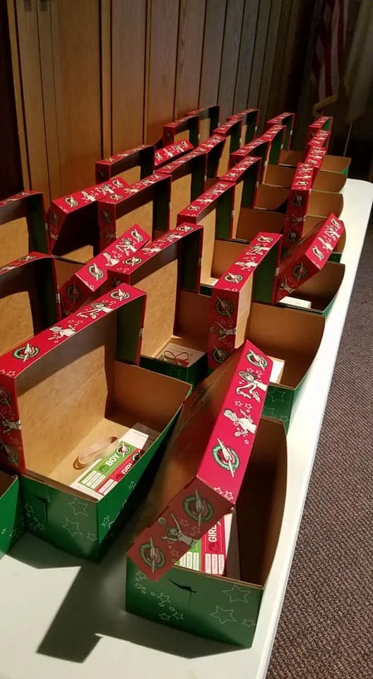 Operation Christmas Child:
In preparation for Christmas, people fill shoeboxes with items that young children would like to have or need for Operation Christmas Child through Samaritan's Purse, who send them to various places in the world, giving chi