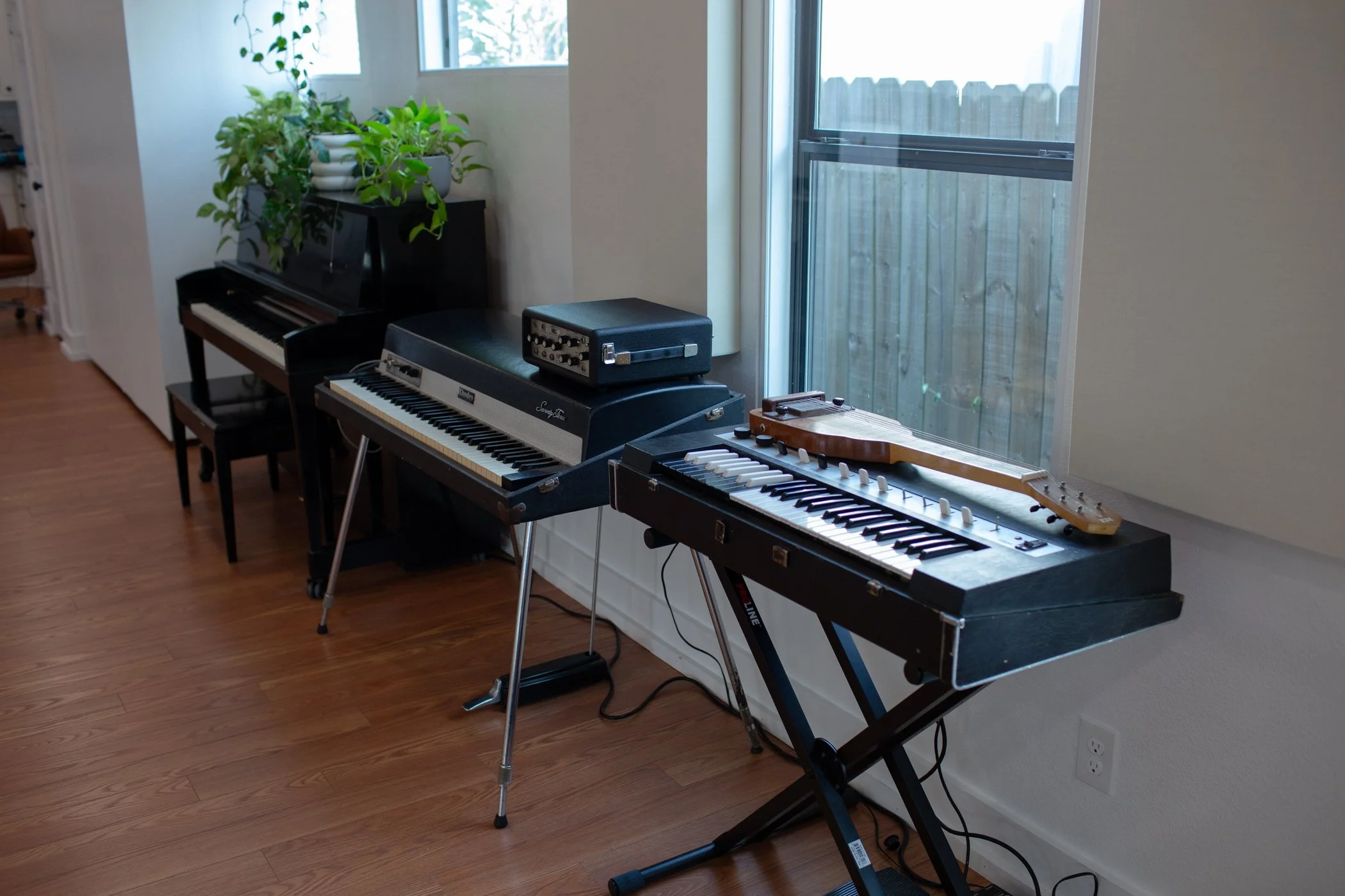 Vintage Yamaha combo organ, 1975 Fender Rhodes and 1975 Baldwin Hamilton upright piano.