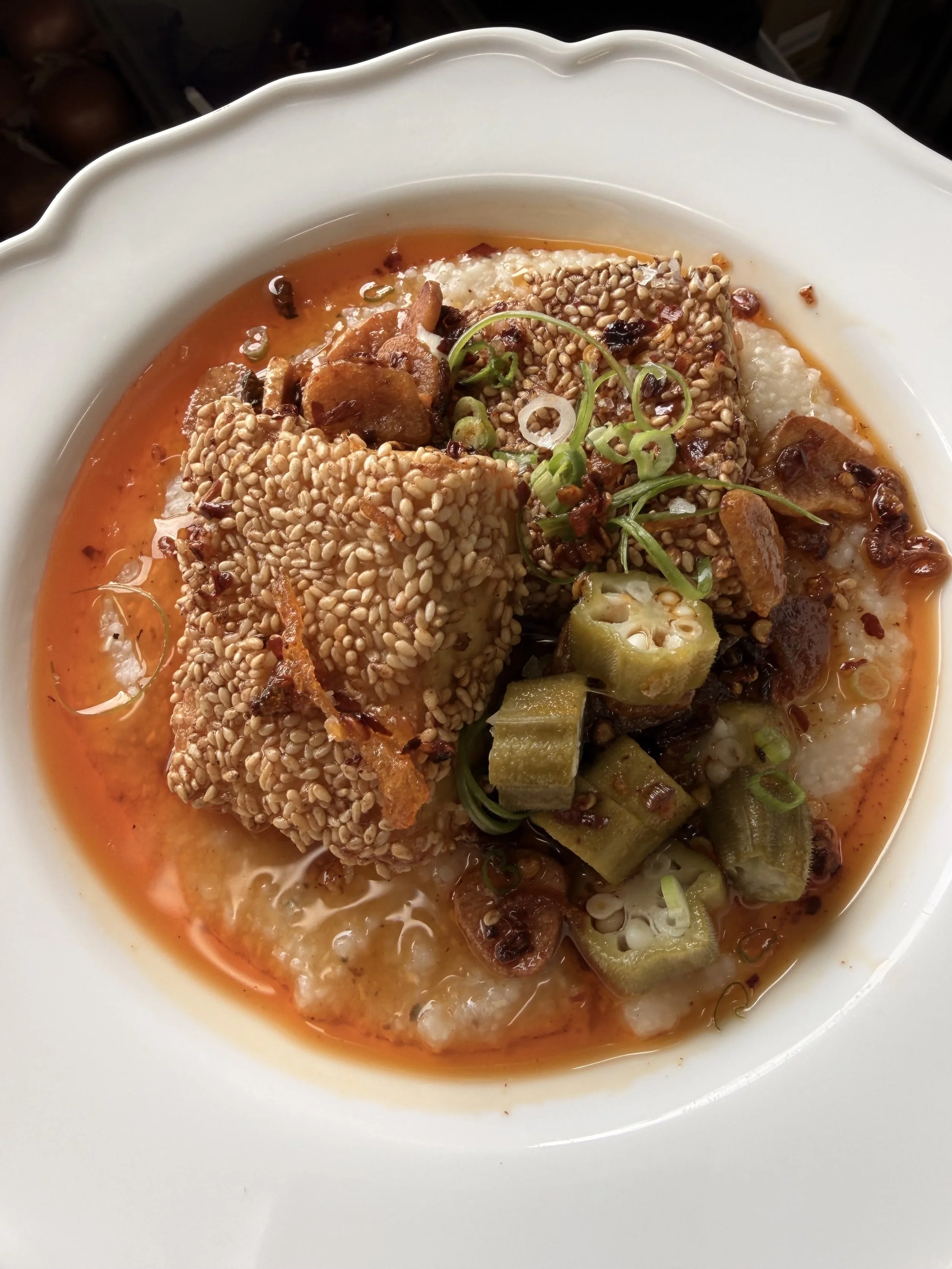 Sesame Crusted tofu + Grits with pickled okra + scallion chili crisp