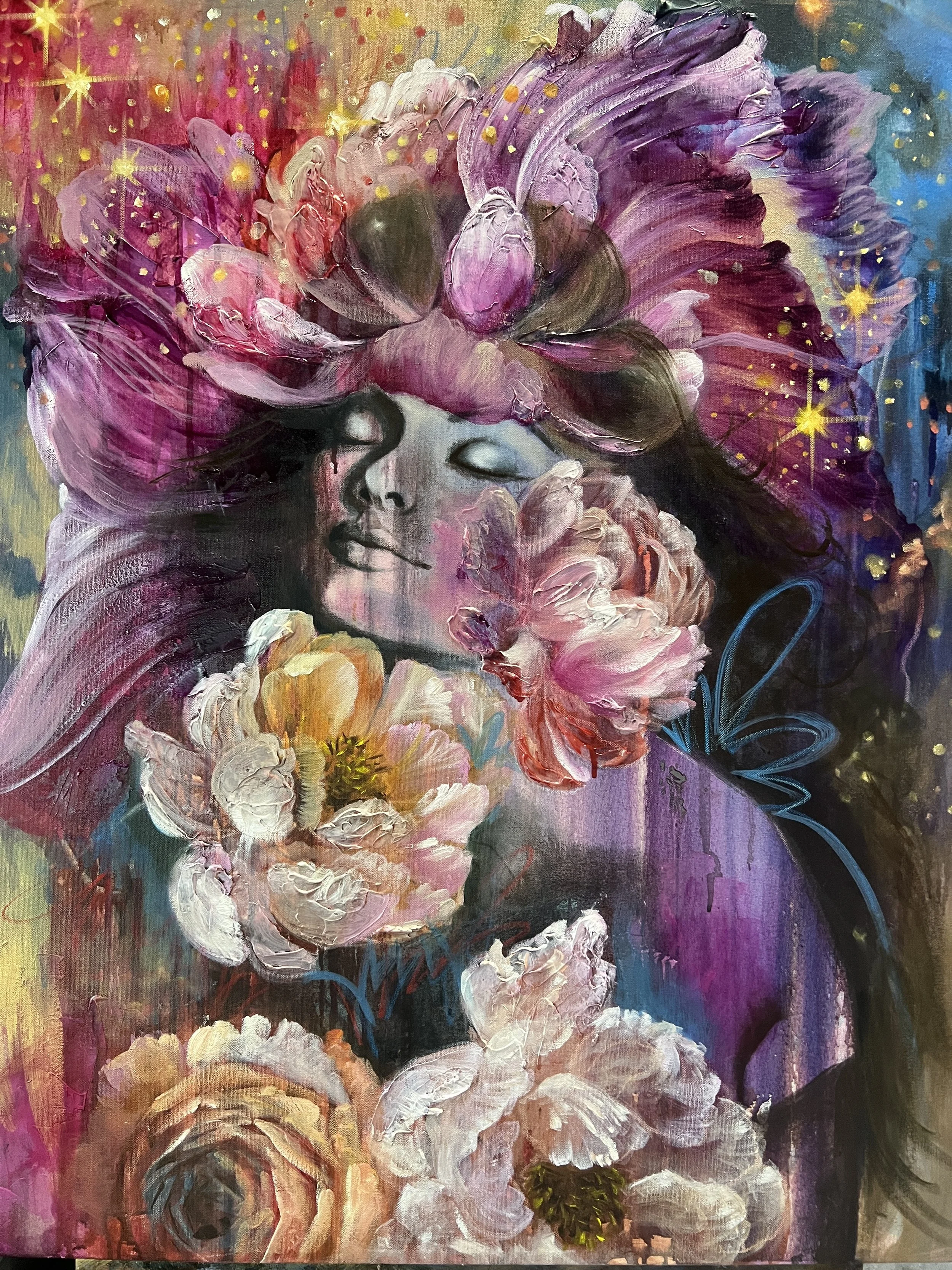 An abstract painting featuring a female face with closed eyes, surrounded by large pink and white flowers and a colorful background with gold and star-like accents.