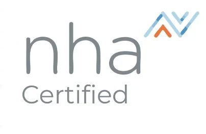 NHA Certified logo with stylized checkmark and upward arrow design in blue and orange.