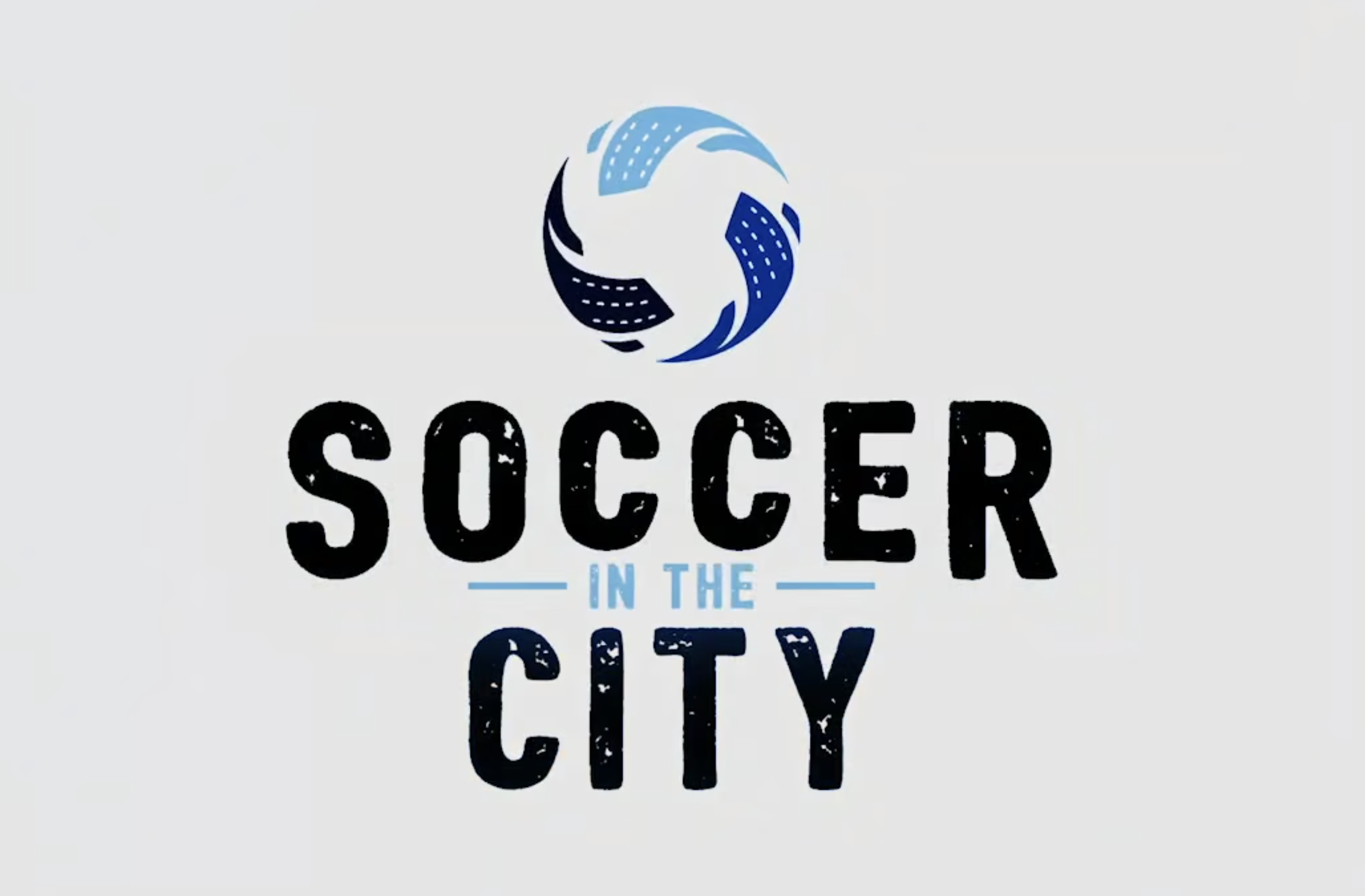 Design graphic with a circular soccer ball logo above the text 'Soccer in the City' in black and blue lettering.