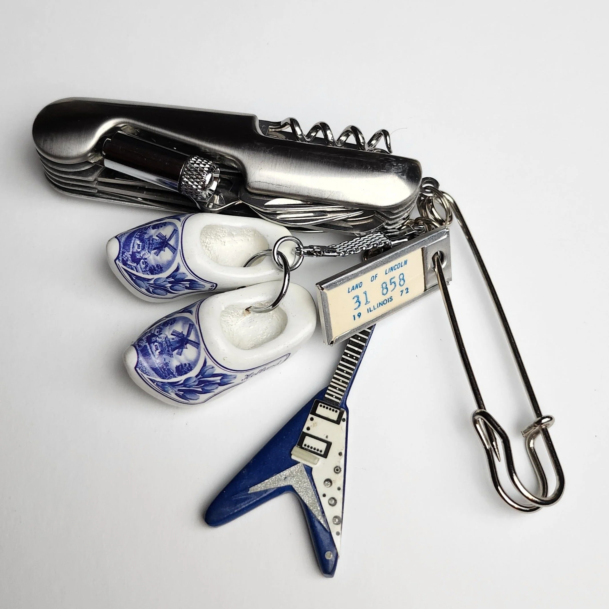 Steel safety pin with vintage pocket knife and charms (2023)