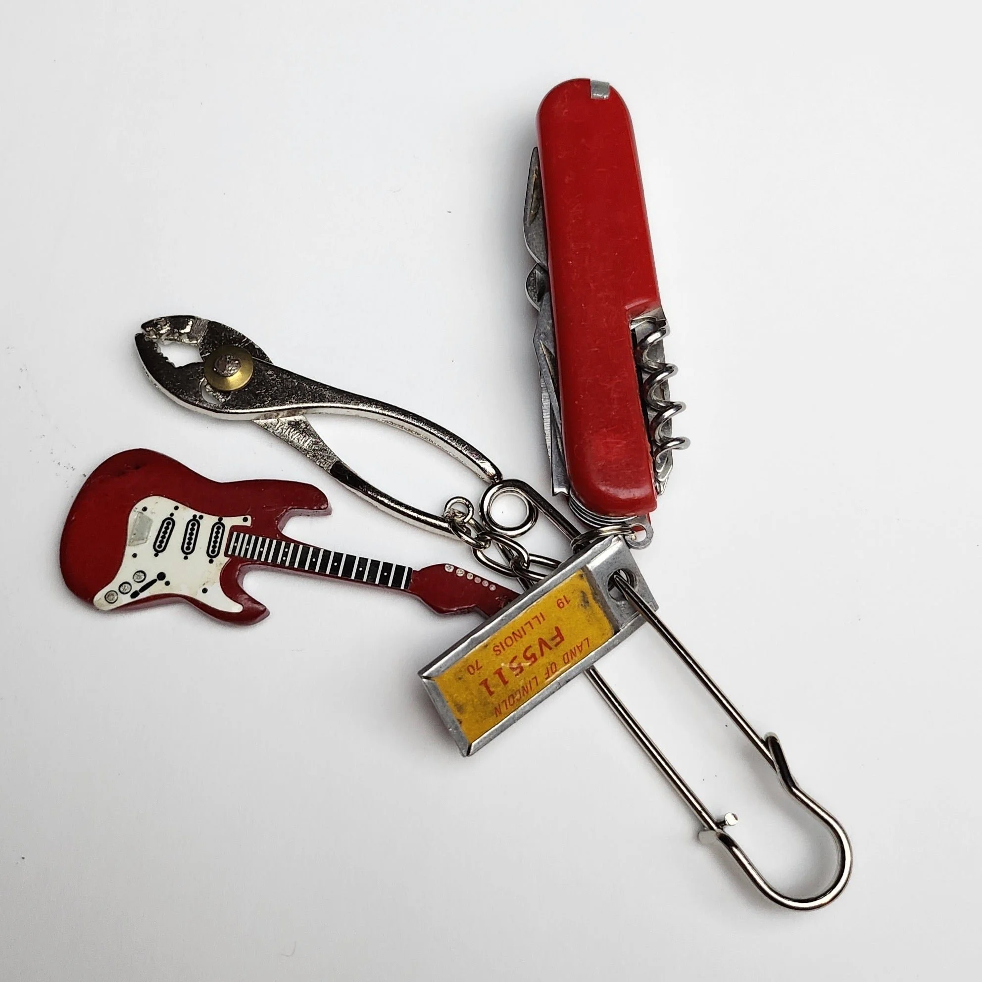 Steel safety pin with vintage pocket knife and charms (2023)