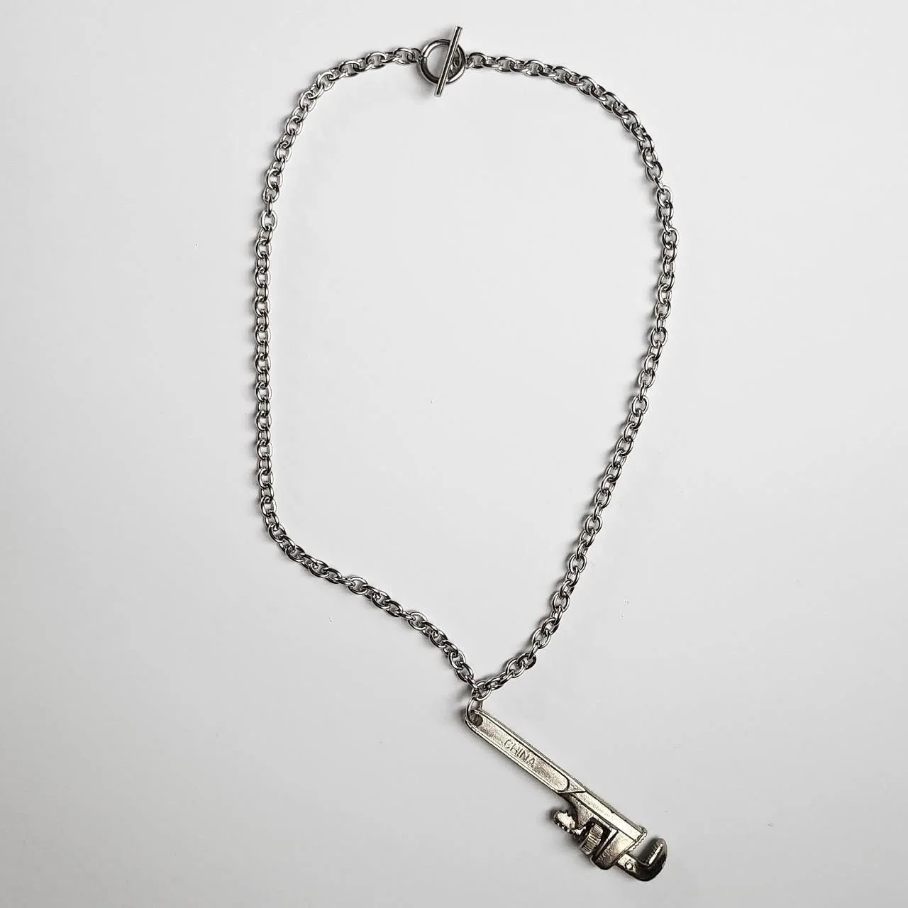 Vintage steel chain and wrench charm (2023)