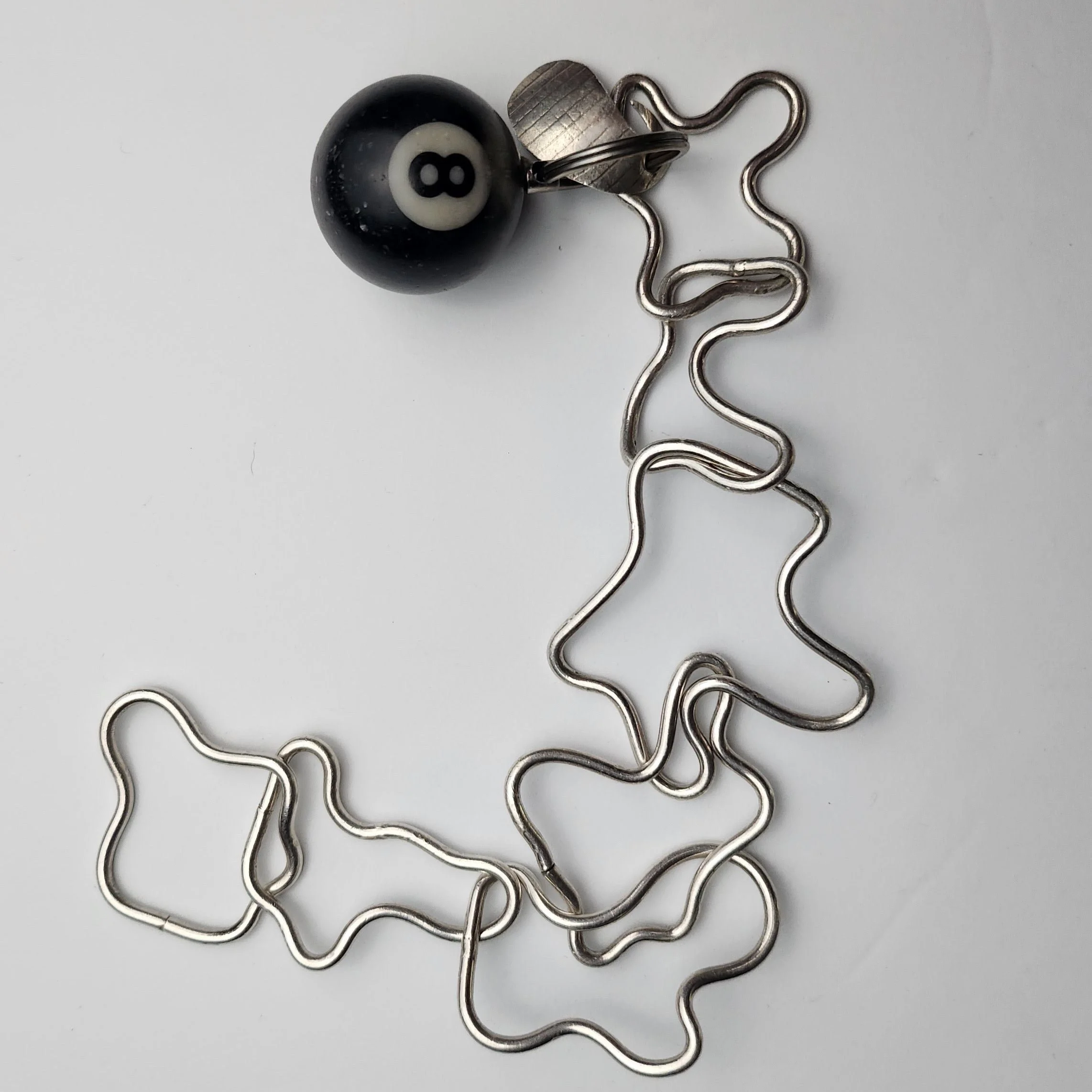 Handmade sterling silver squiggly keychain with custom and vintage charms (2022)