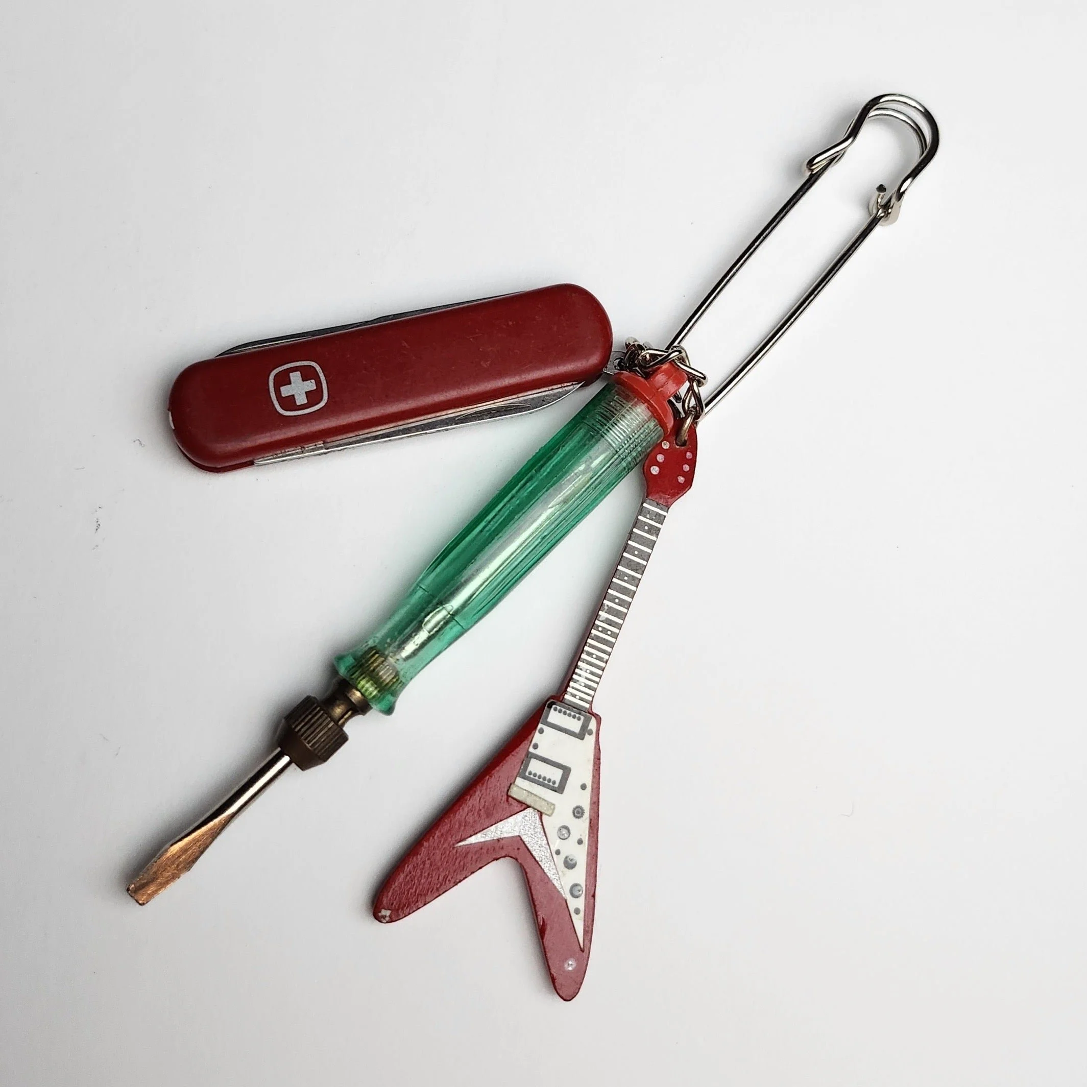 Steel safety pin with vintage pocket knife and charms (2023)
