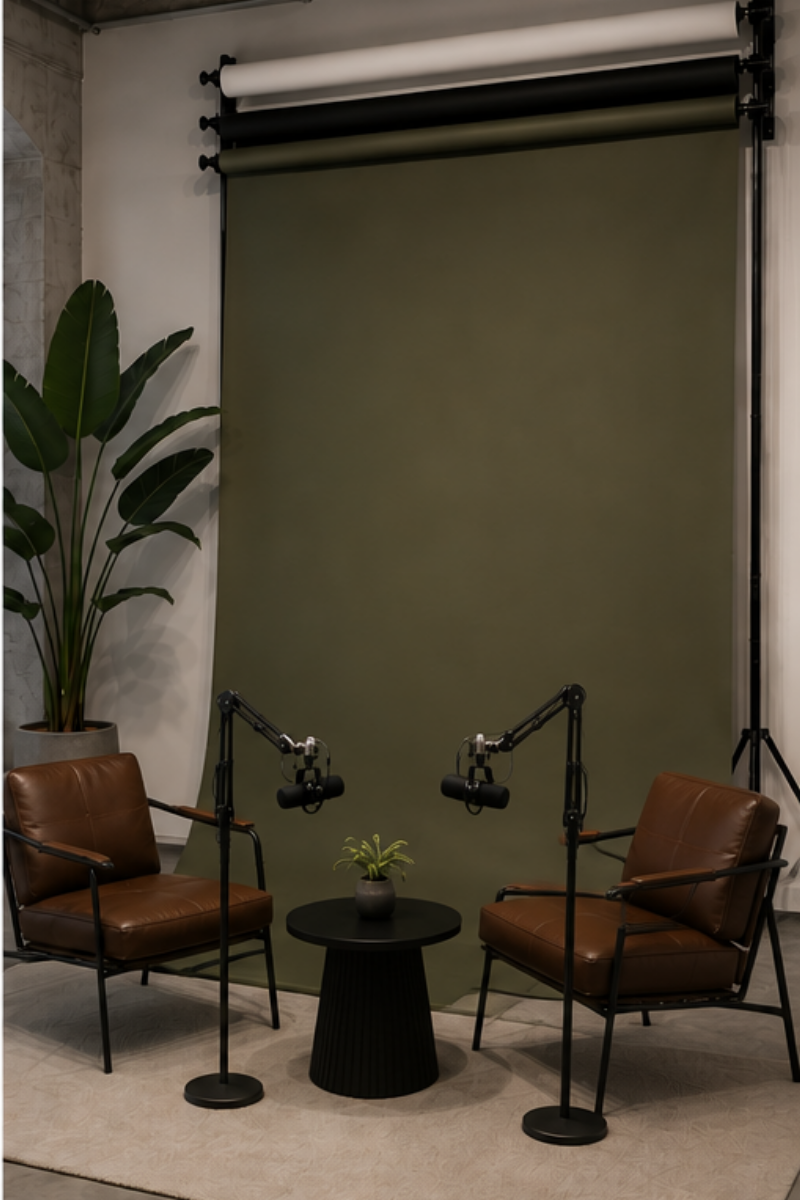 Two-Four person podcast studio at Paradise Palms Studio in Bali with professional microphones and interchangeable studio backdrops.