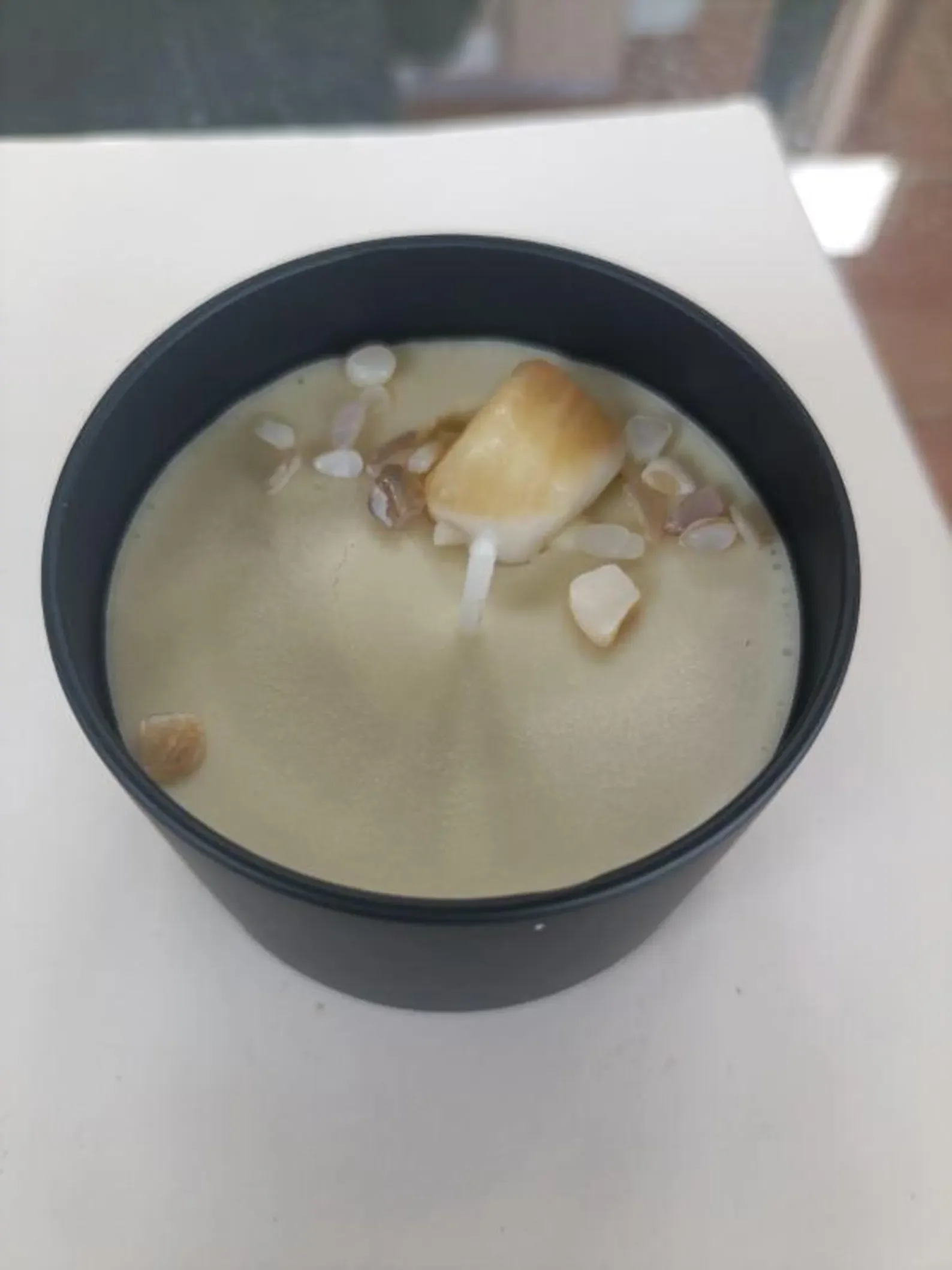 candle with stone.webp