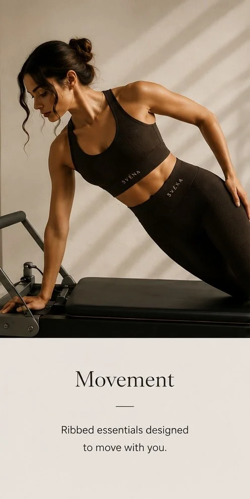 Woman in black workout clothes performing a side plank on a Pilates reformer machine in a fitness studio.