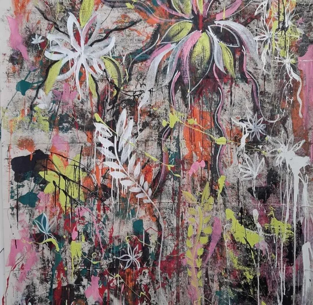 Abstract painting with splashes of bright pink, orange, yellow, black, white, and teal, featuring layered floral and foliage forms with drips and bold strokes.