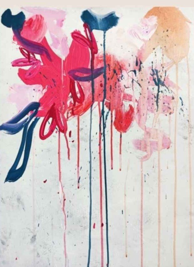 Abstract painting with splashes of pink, red, blue, and orange paint, featuring drips and brushstrokes on a white background.