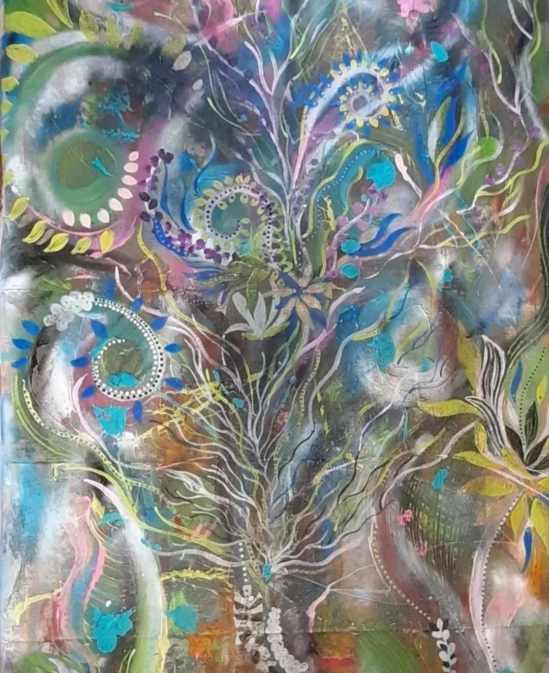 Abstract painting of a tree with swirling branches and leaves in bright colors, including blue, yellow, pink, and green.