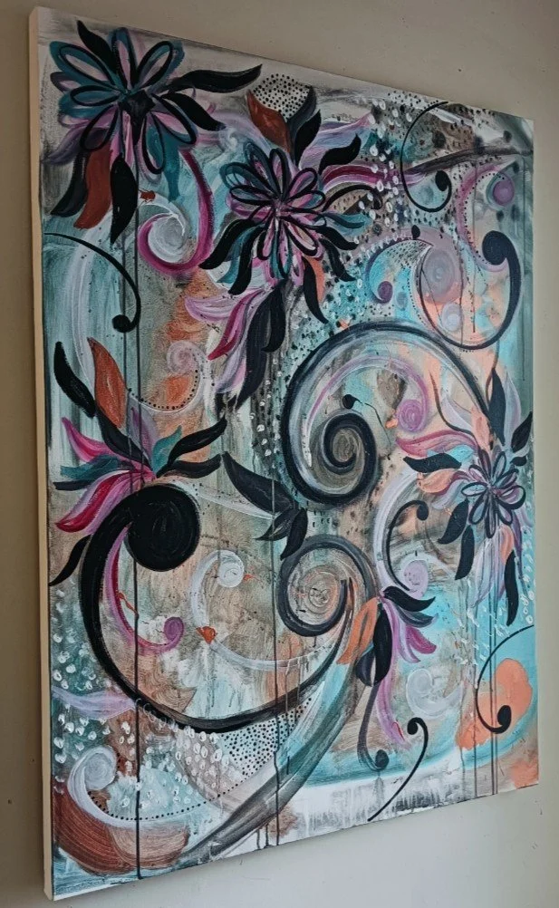 Abstract floral painting with large swirling black and pink flowers, colorful leaves, and intricate swirling patterns on a textured background.
