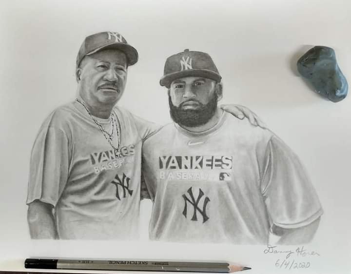 A realistic pencil drawing of two men wearing New York Yankees baseball shirts and caps, standing side by side with arms around each other's shoulders, on a white background.