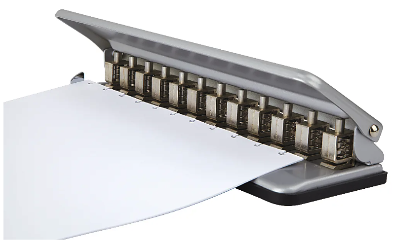 A paper puncher for disc system with a sheet of paper inserted, positioned on a white background.