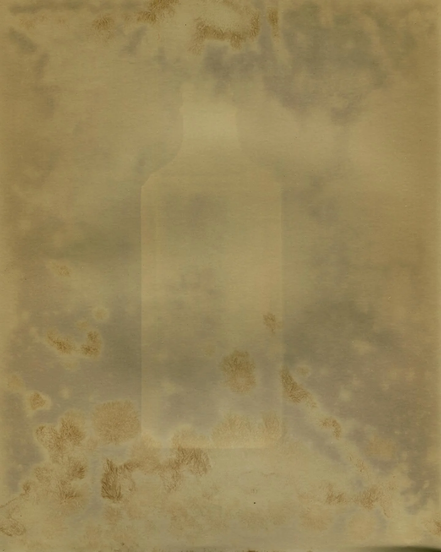 My practice leans into imperfection, chance, and the unexpected. Today&rsquo;s unexpected result came from a box of expired paper, fogged and a little mouldy. Instead of throwing it out, I took it outside and placed an old glass bottle on it. This im
