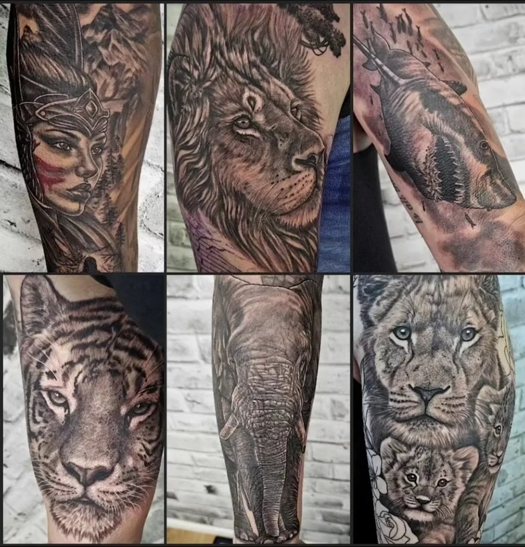 Collection of six black-and-gray tattoos featuring animals and a person. The tattoos include a woman's face with a crown, a lion's face, a whale, a tiger, an elephant, and a lion with a cub.