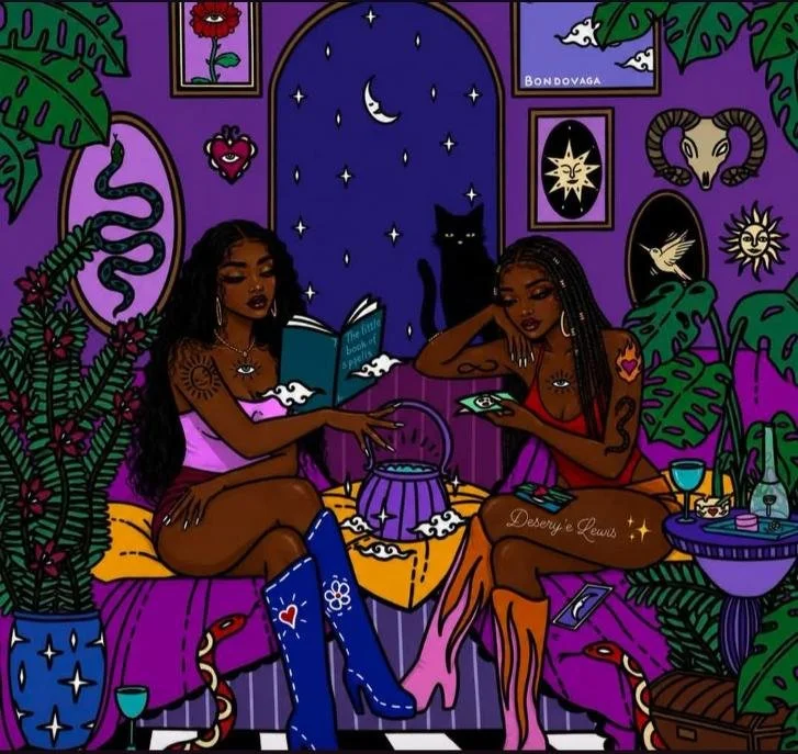Two women with tattoos and dark hair sitting in a purple room filled with plants, framed art, and decorative animals, drinking and reading. A crescent moon and stars are visible through a window.