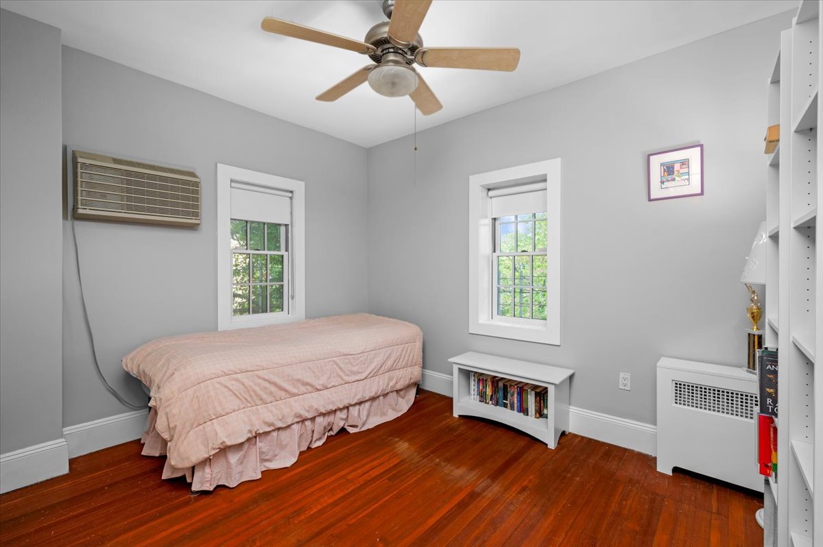 Third bedroom, second level, street and and garden views, Eastern and Northern exposures, closet, separate built-in drawers and bookcase