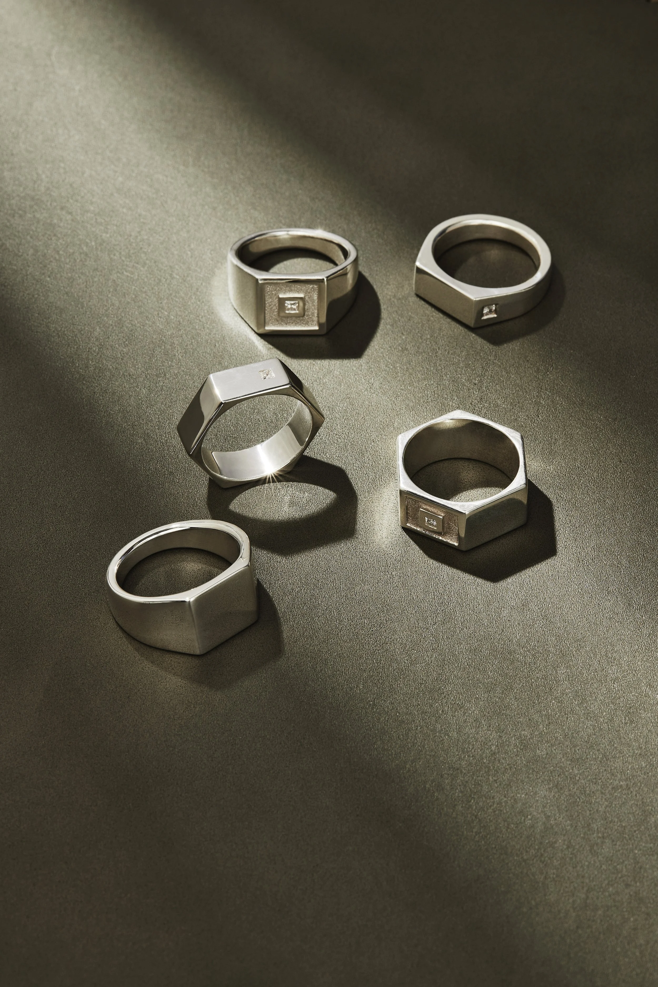 S10-Laying out Screw Bracelets on green leather mat (andor Walnut) Wearing gloves-24925-Westhill-0142.jpg