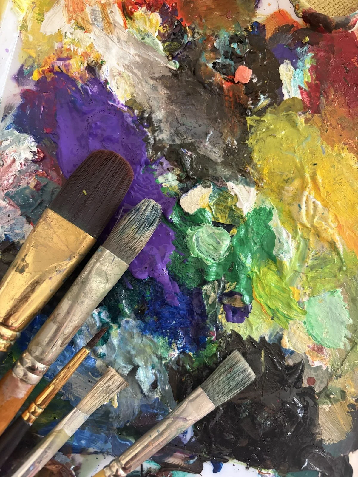 Paint splodges and paint brushes