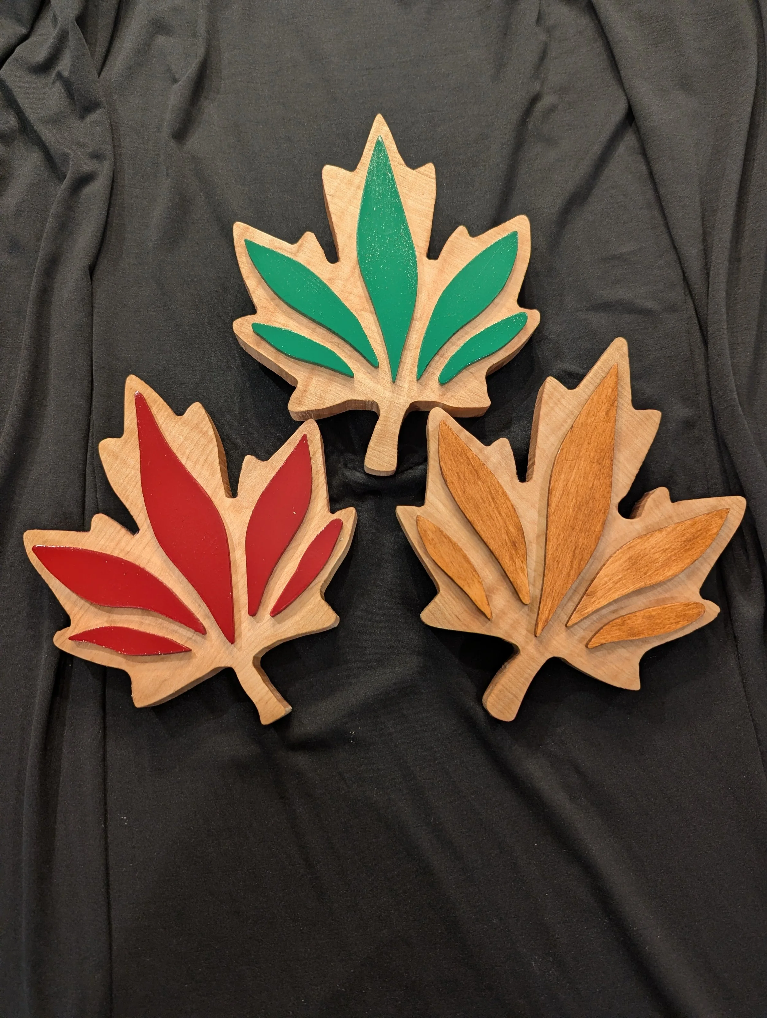Maple Leaf - offered with a stain maple, red, or green accent