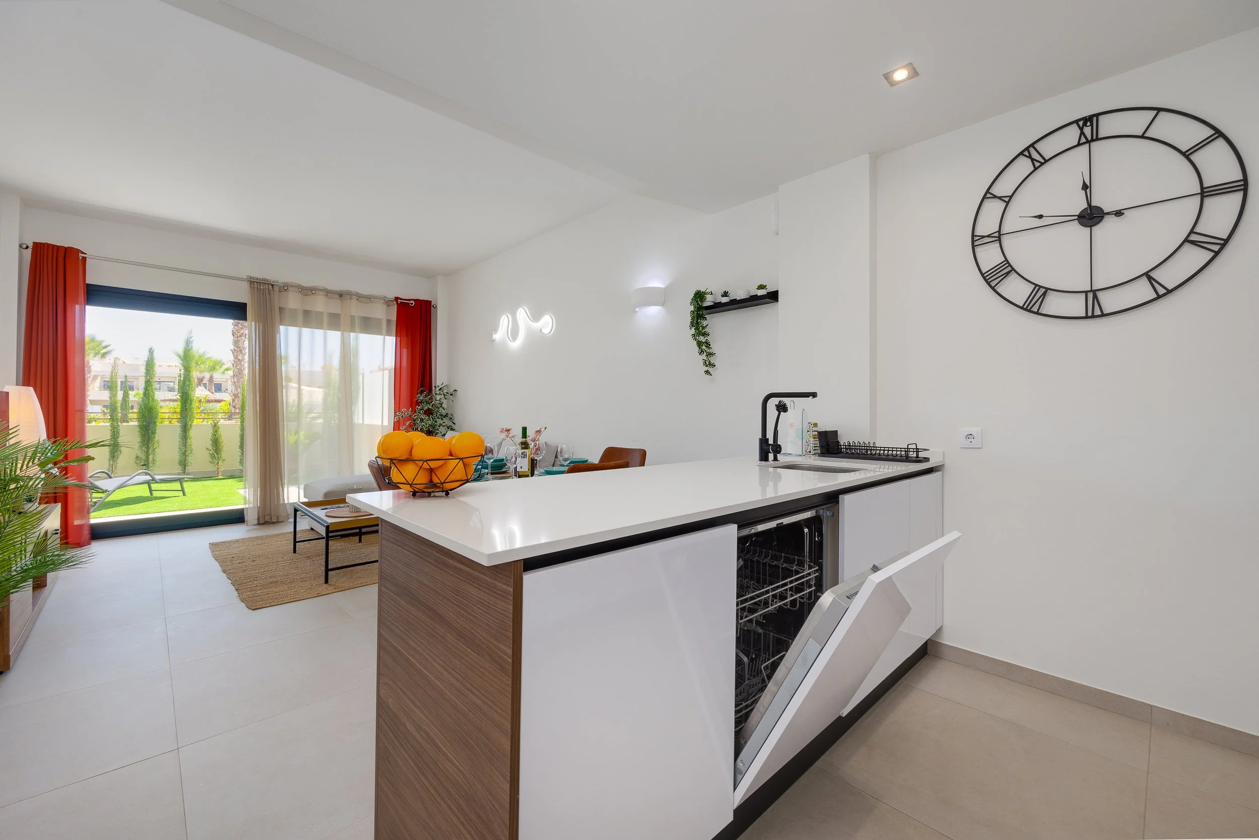 Modern open-plan living with direct terrace access.