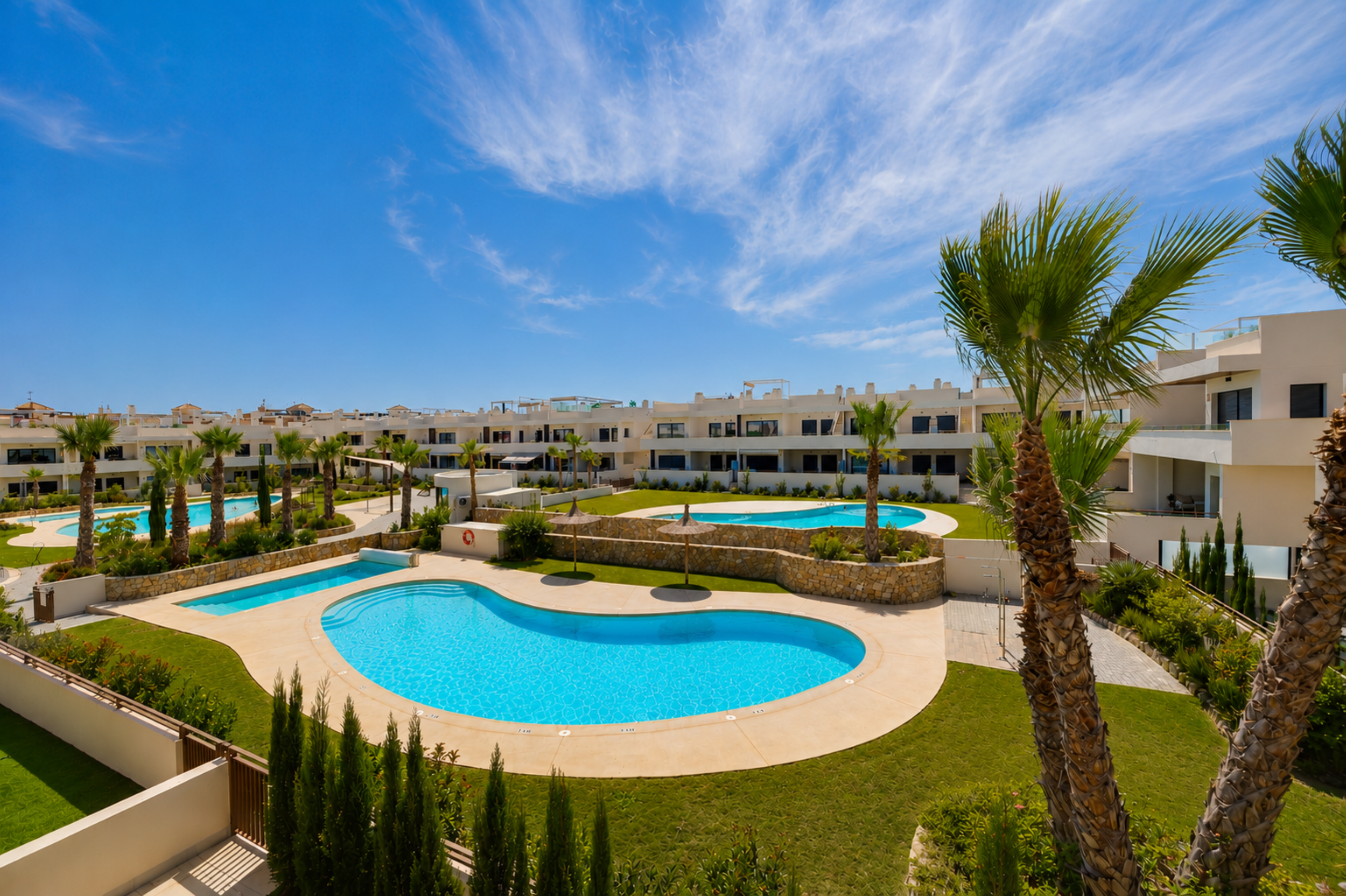 Enjoy beautiful views across the resort's swimming pools.