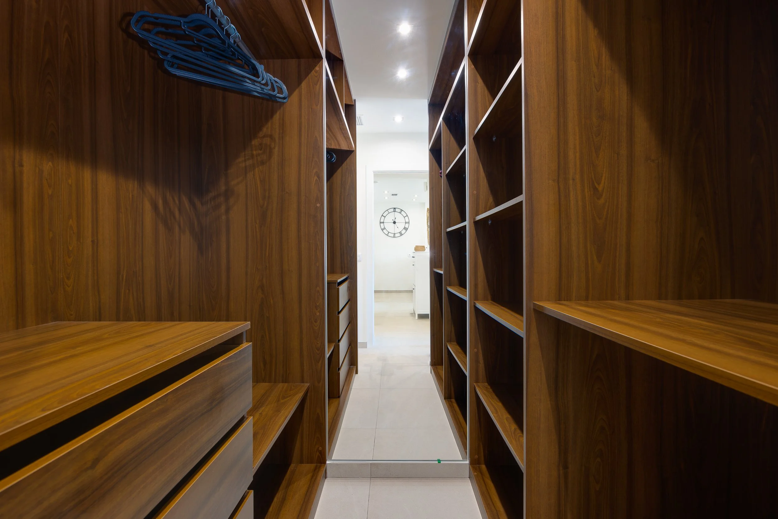 A spacious walk-in wardrobe with plenty of room for longer stays.