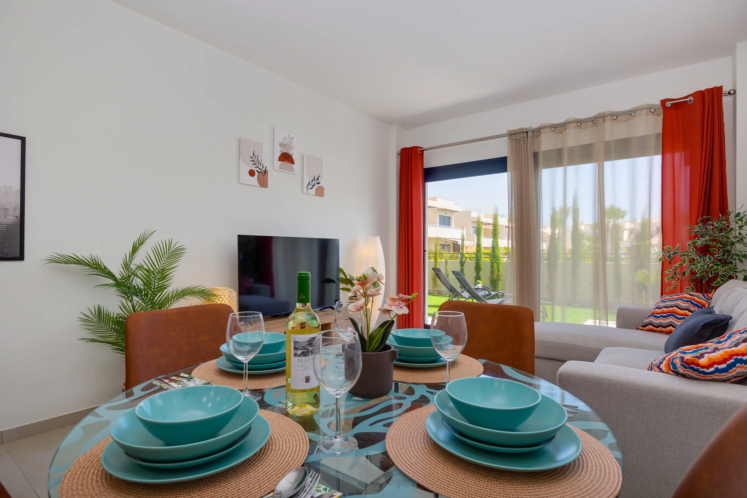 A welcoming dining area beside the fully equipped modern kitchen.