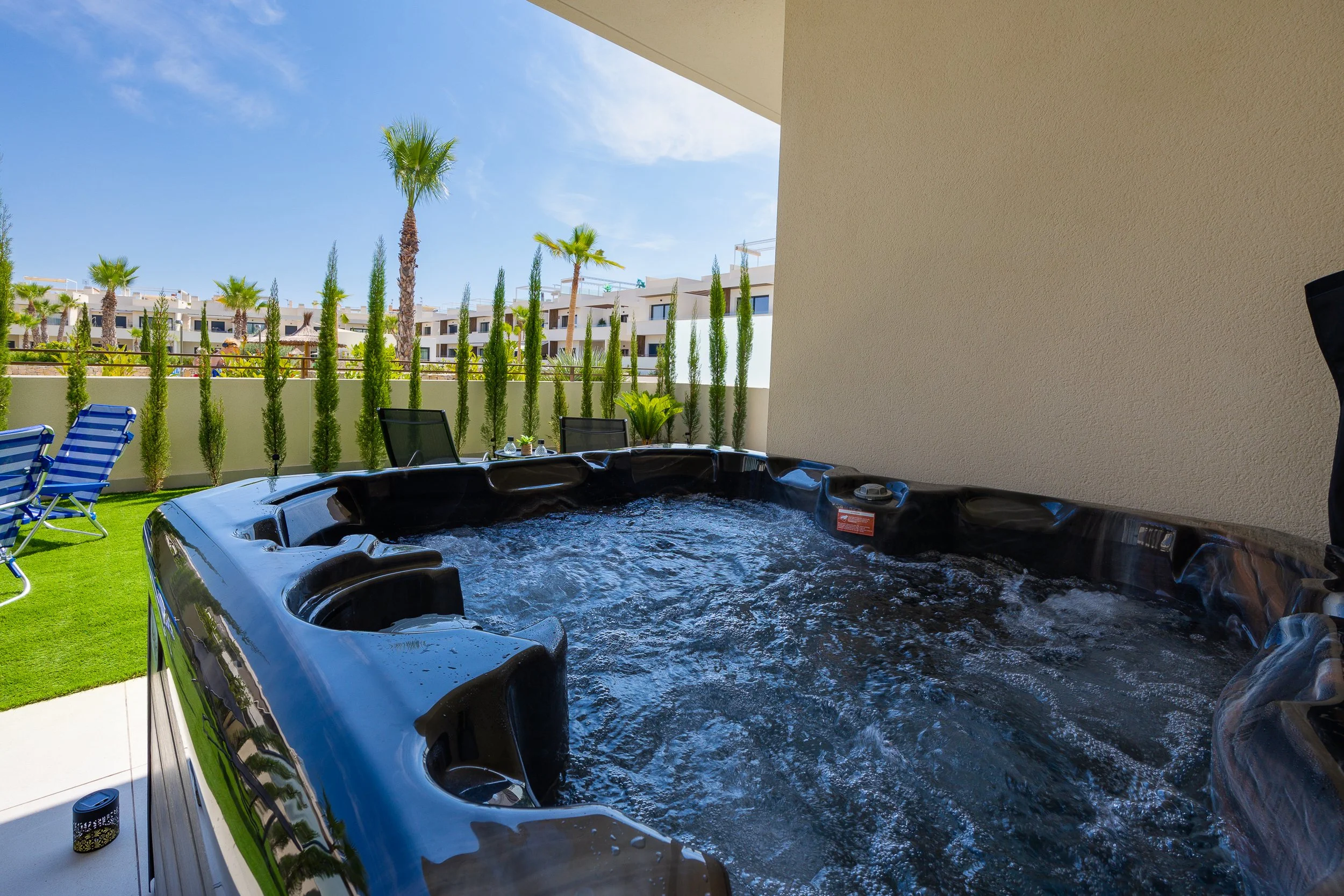 Relax in your private hot tub whenever you like.