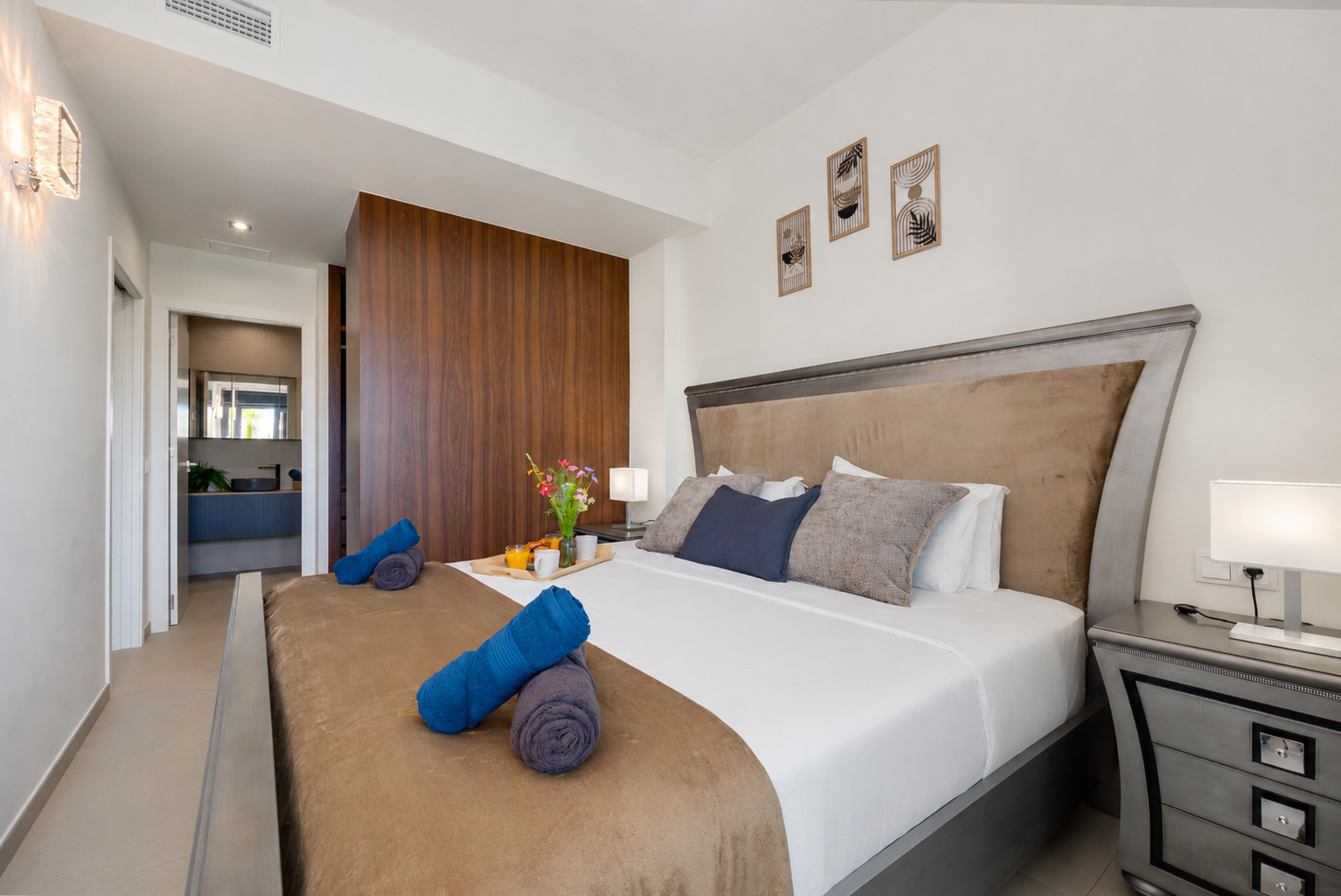 A peaceful master bedroom with direct access to the terrace.