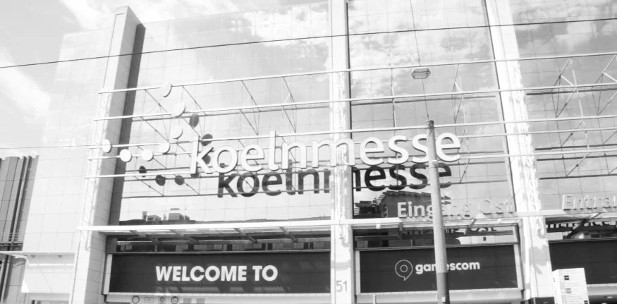 Koelnmesse entrance with gamescom welcome sign, Cologne trade fair venue
