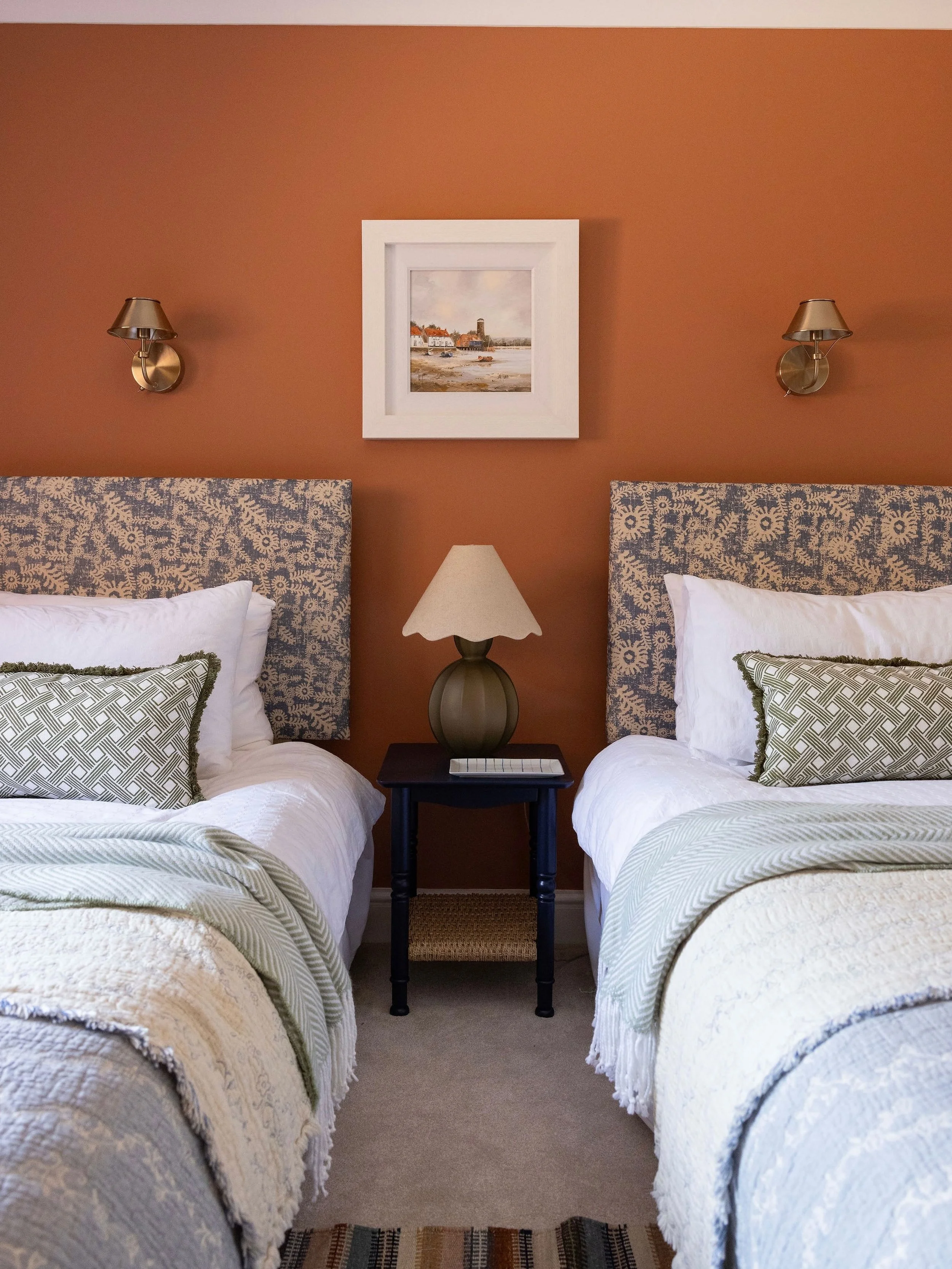 Project Spotlight | Chichester Harbour House 

The inspiration behind this warm and cosy twin guest bedroom was the local coastal landscape and the clients&rsquo; love of being on and by the sea.

The orange glow of a sunrise row or a sunset walk. 

