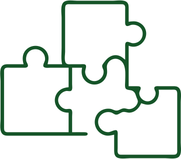 Four interconnected puzzle pieces outline in green
