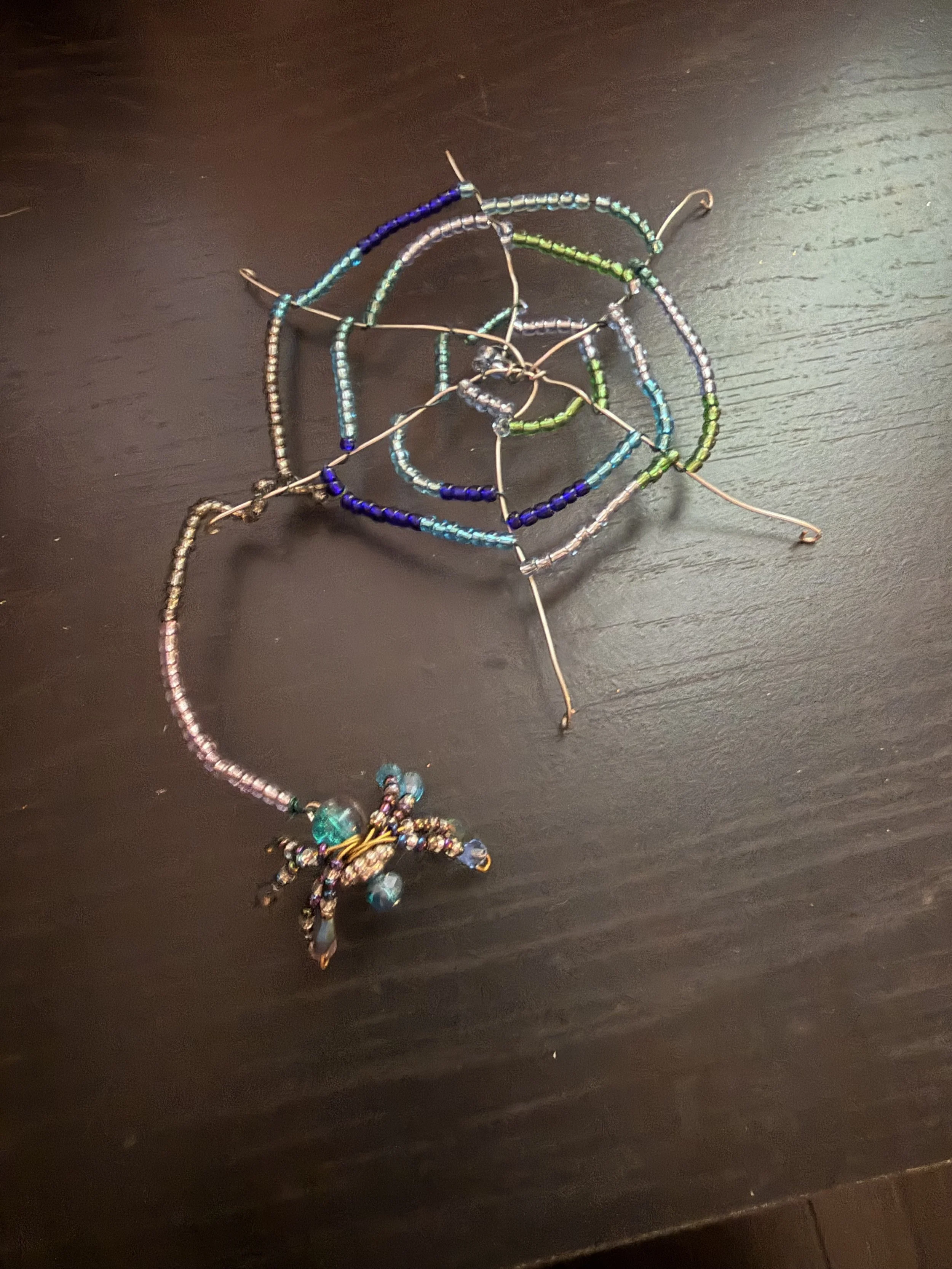 Teal spider web
