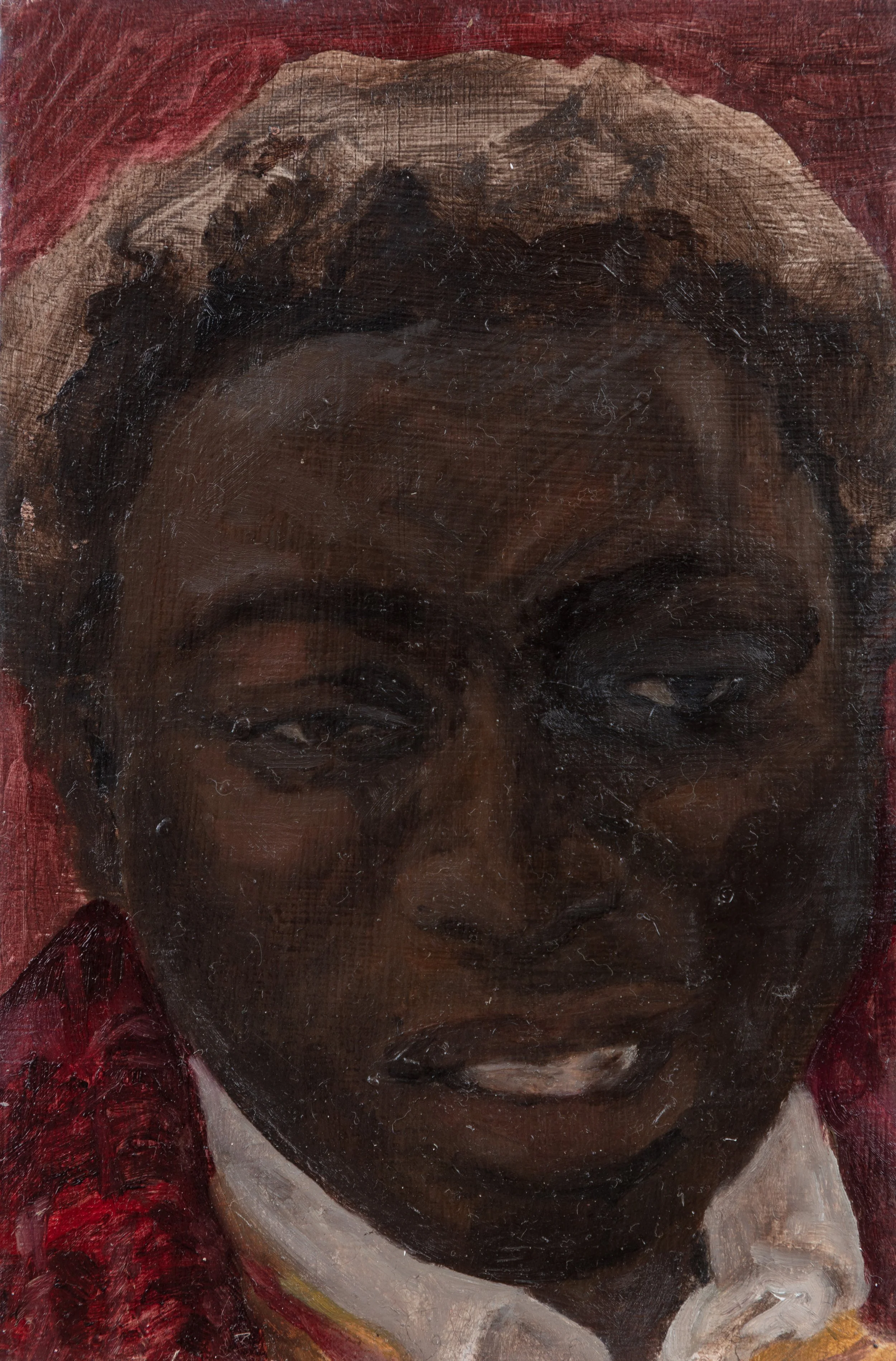 Close-up of a Renaissance-style painting of a person with dark skin, wearing a red garment, with a contemplative expression.
