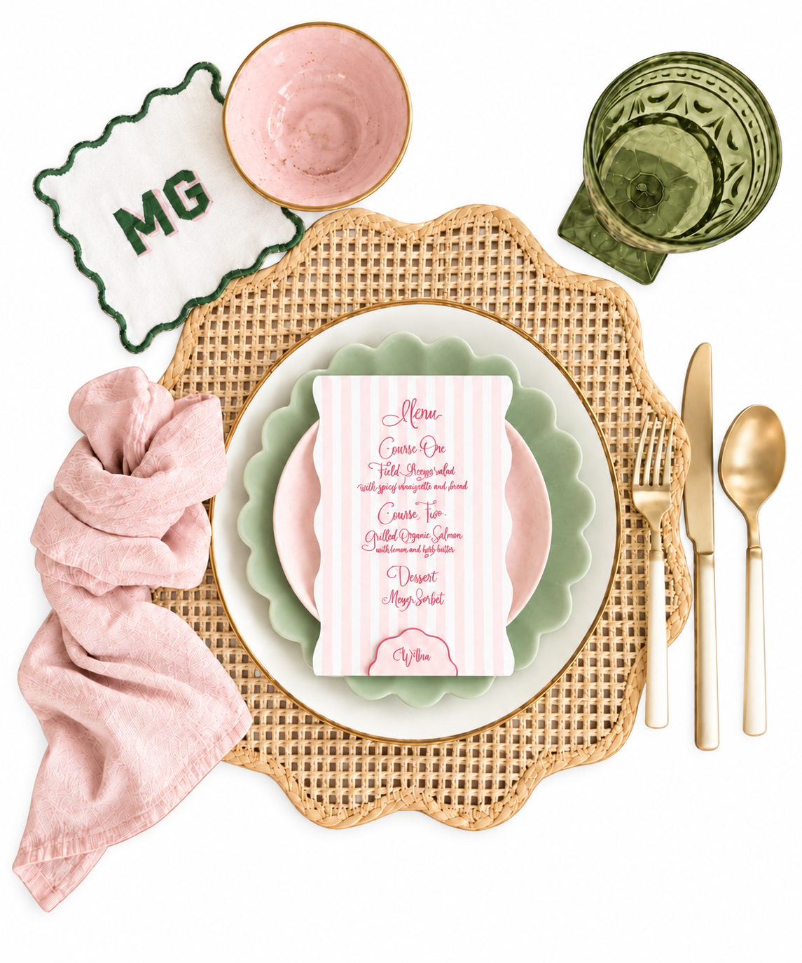 Pink and sage green place setting with a striped hand-lettered menu, coordinating place card, woven scalloped placemat and monogrammed cocktail napkin by Meg&Co
