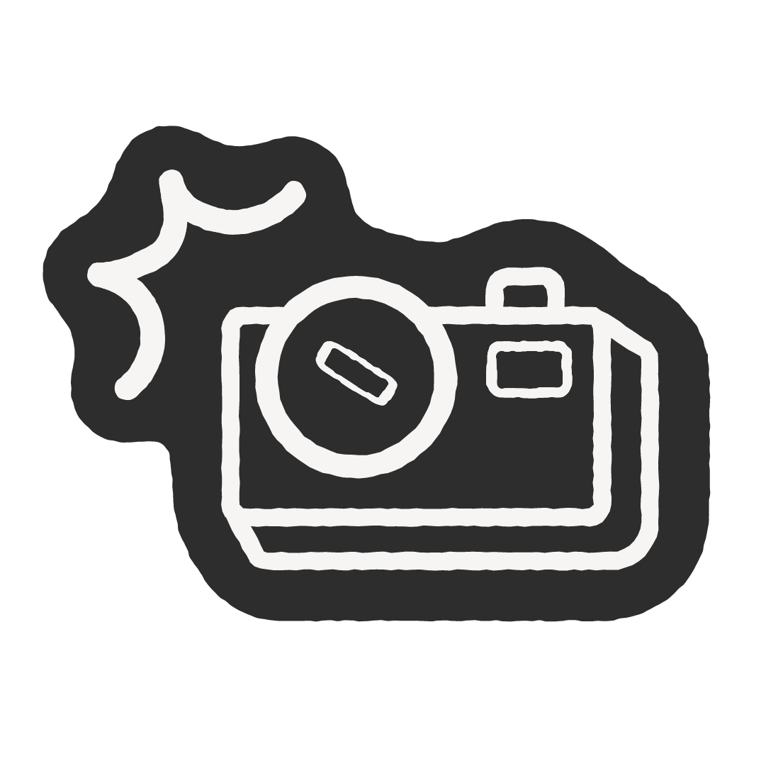 Illustration of a vintage camera with a flash symbol