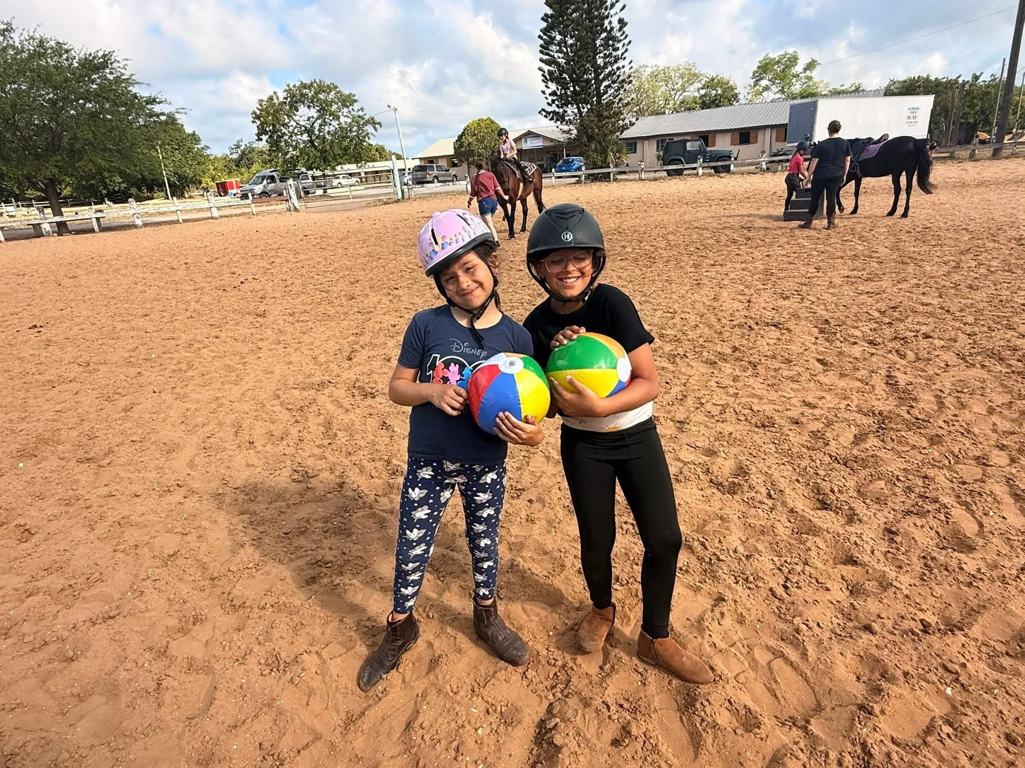 Horse club kids having a ball in the arena