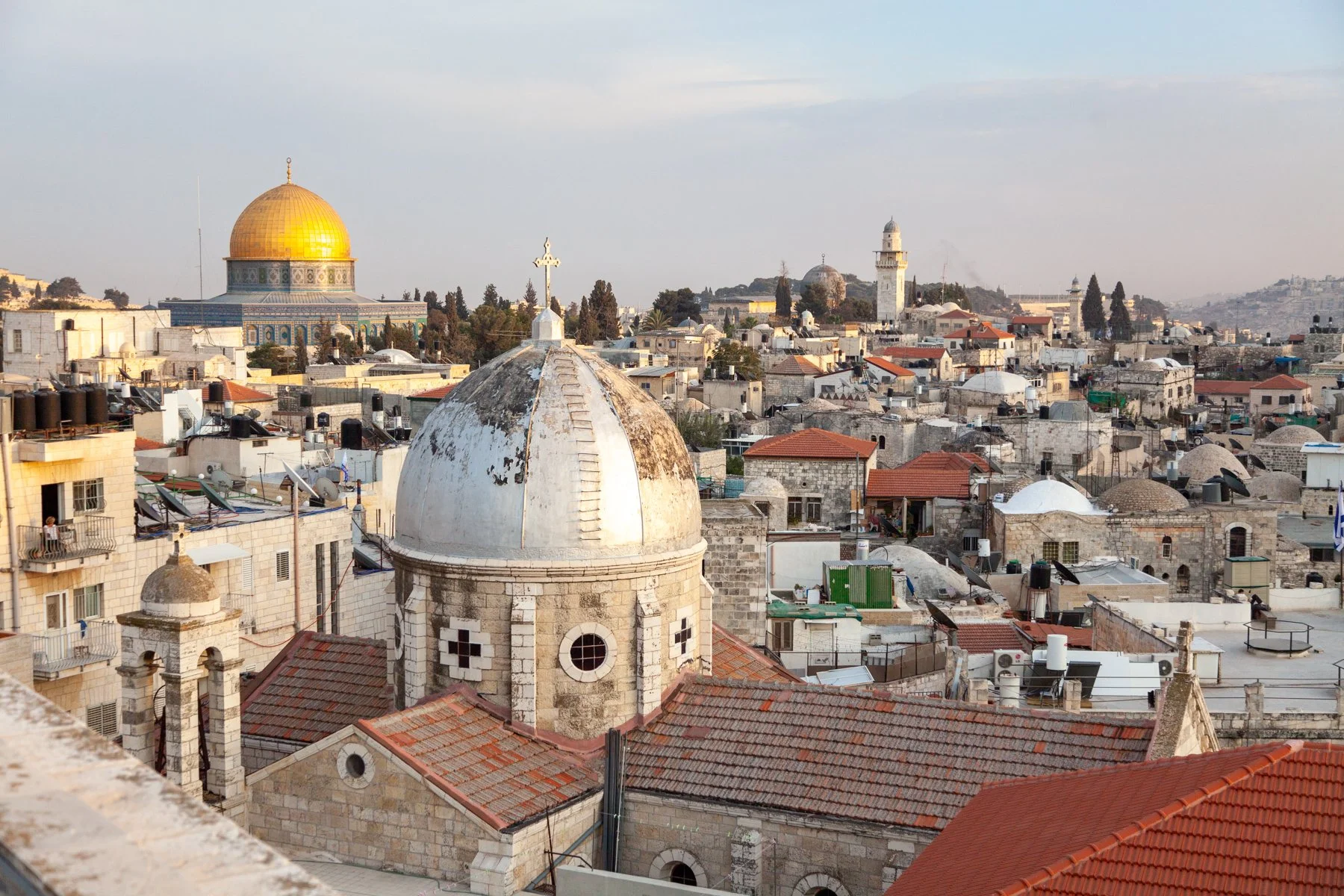 Panoramic view of Jerusalem’s Old City with the Dome of the Rock and church domes.
