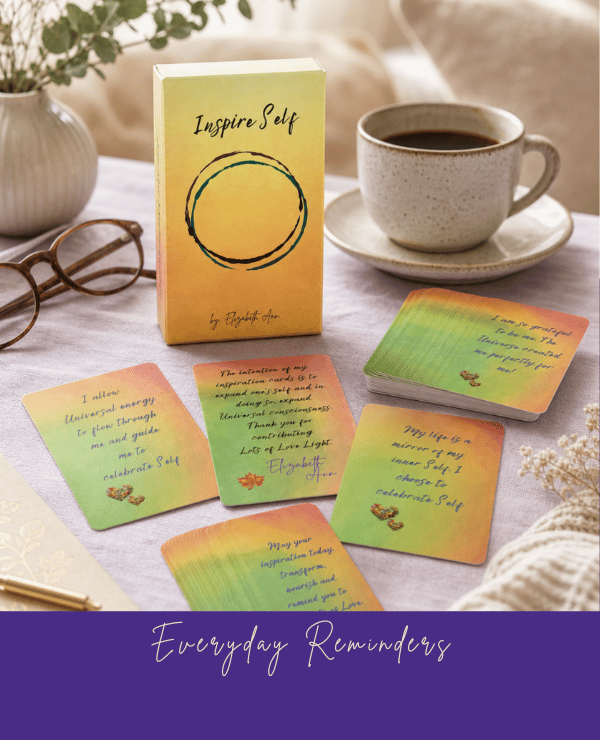 Inspire Self affirmation card deck displayed with motivational quote cards, coffee, journal, and glasses, encouraging positive thinking, self-reflection, and daily inspiration.